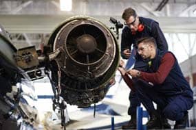 aircraft-mechanics-working-on-propeller