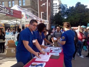Students volunteer for flu shot clinic at Walgreens
